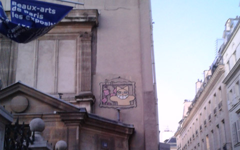 Street art à Paris - chat de cheshire